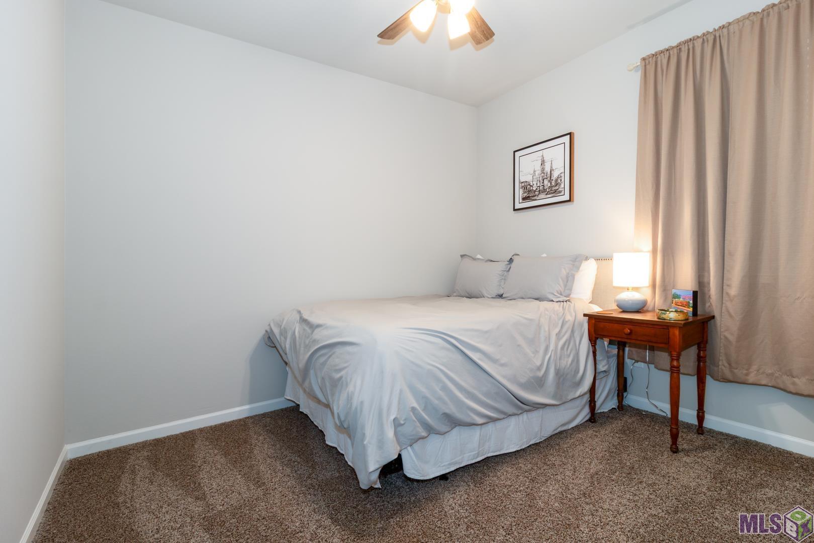 6407 Tiger Pointe Dr. St. George, LA 70817 - Photo 15 of 23 Second bedroom