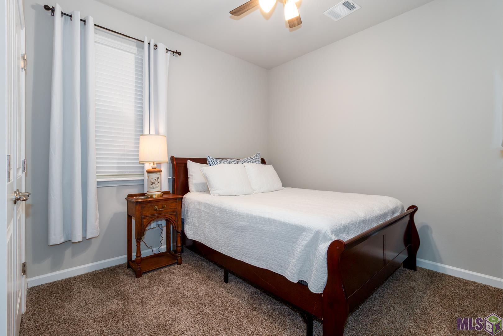 6407 Tiger Pointe Dr. St. George, LA 70817 - Photo 15 of 23 Third bedroom