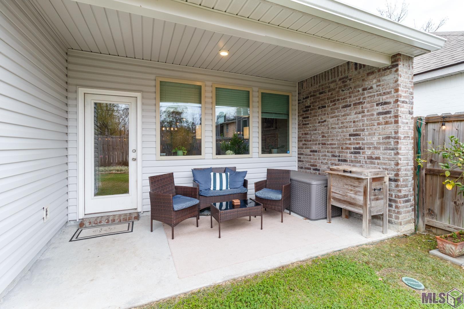 6407 Tiger Pointe Dr. St. George, LA 70817 - Photo 20 of 23 Covered back porch lends itself for entertaining!