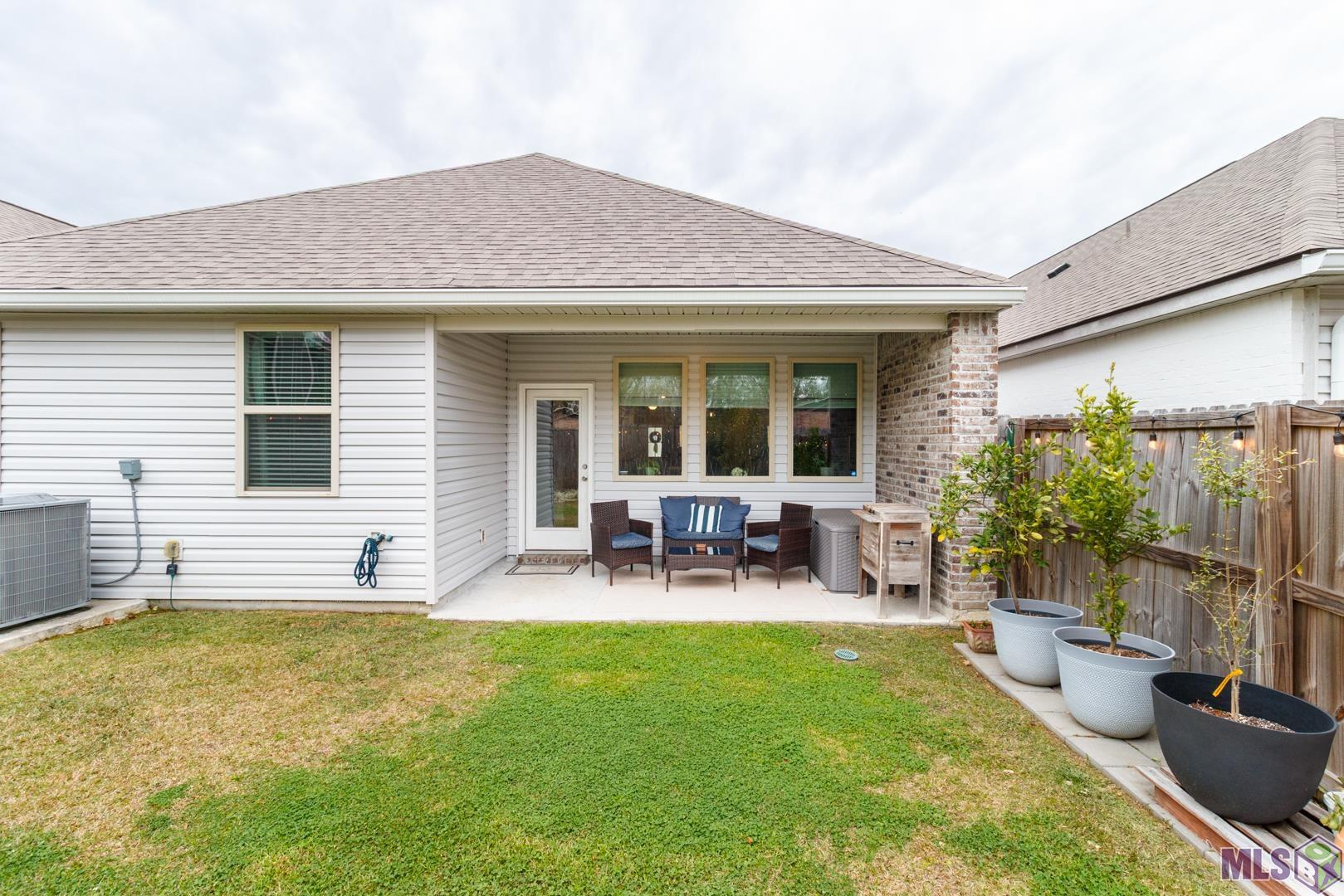 6407 Tiger Pointe Dr. St. George, LA 70817 - Photo 20 of 23 View of back of the home