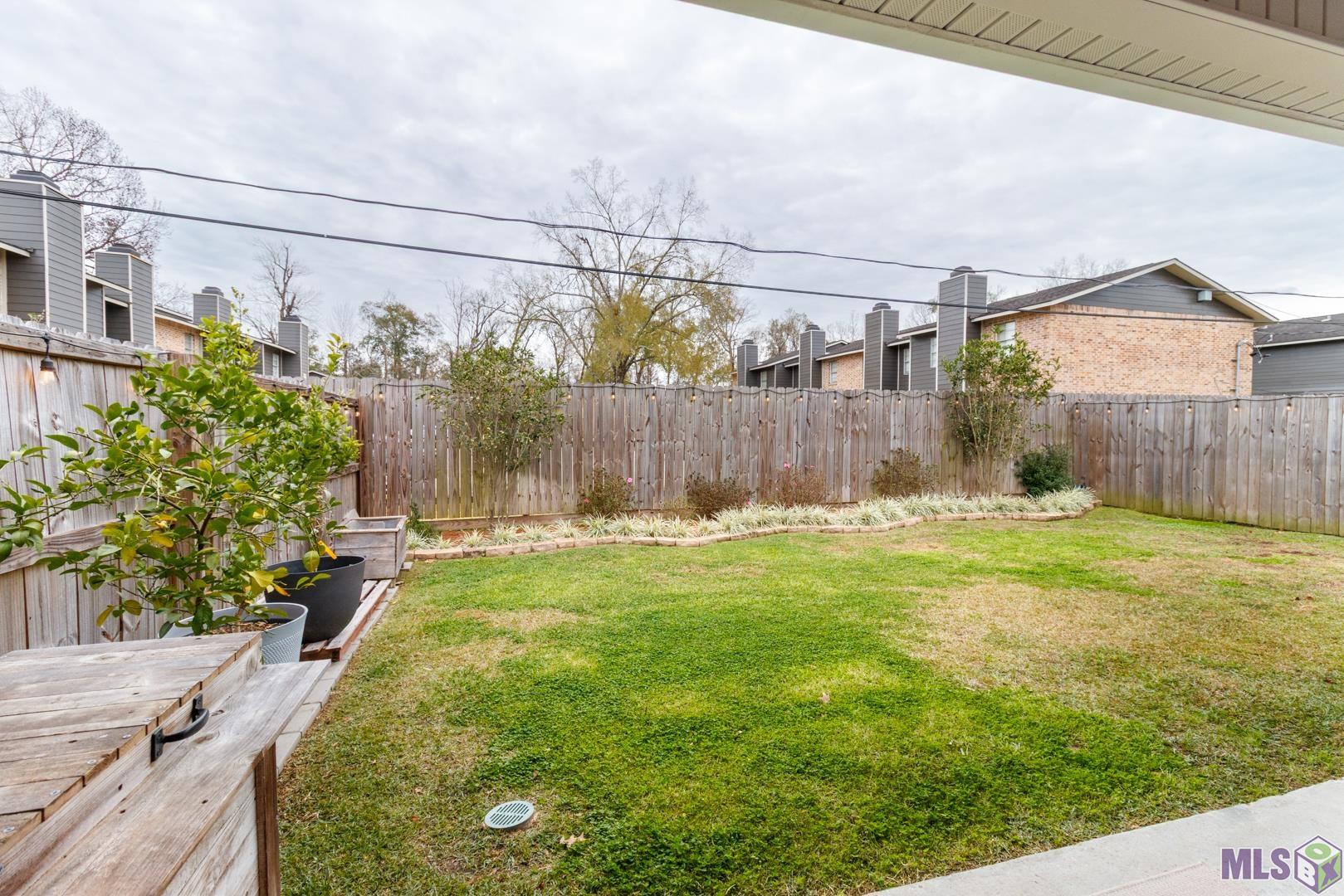 6407 Tiger Pointe Dr. St. George, LA 70817 - Photo 22 of 23 Beautiful landscaping already in place!