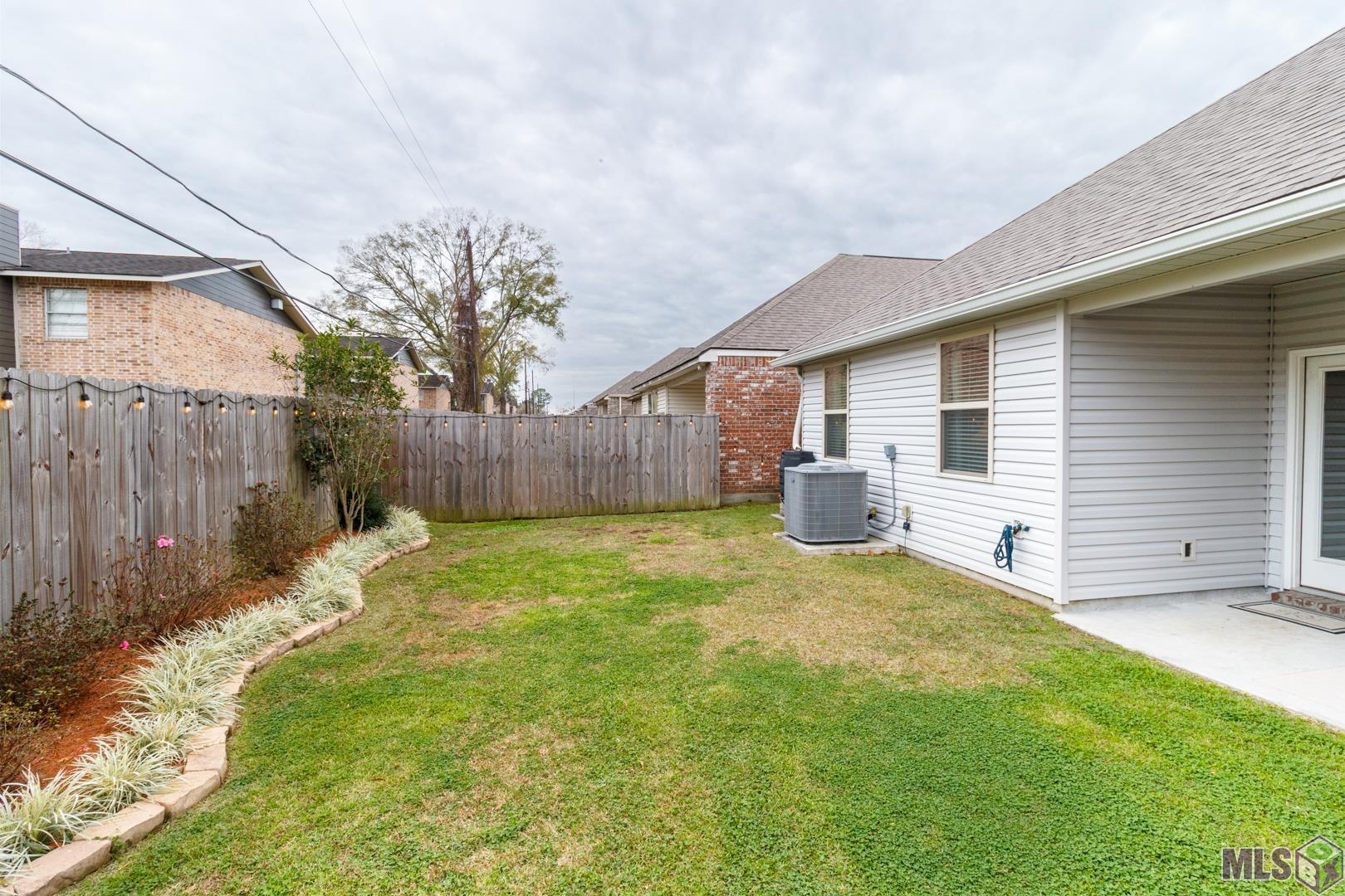 6407 Tiger Pointe Dr. St. George, LA 70817 - Photo 22 of 23 Fully fenced backyard great for furry babies!