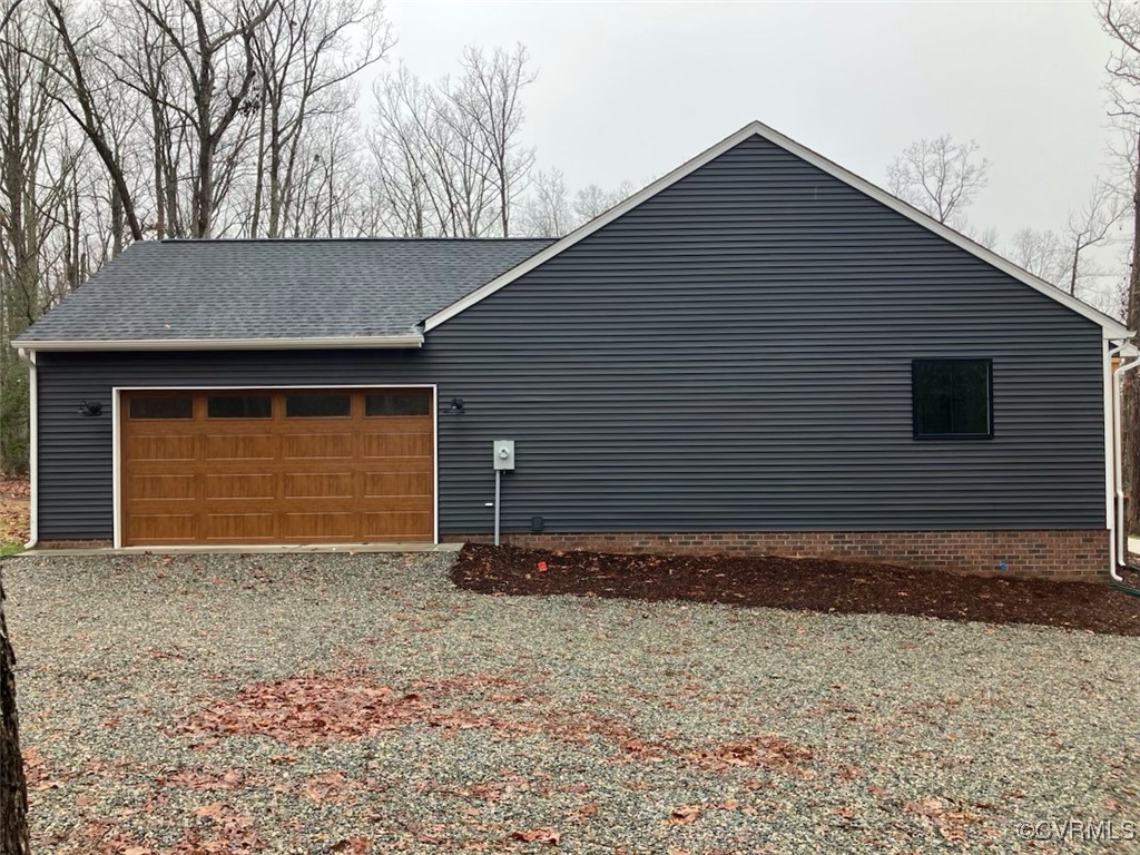 1427 Page Road Powhatan, VA 23139 - Photo 24 of 28 View of property exterior with a garage