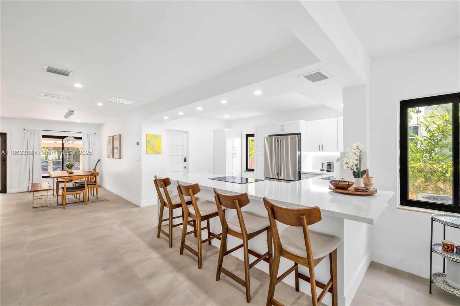 341 Southwest 21st Road Miami, FL 33129 - Photo 8 of 36 a dining room with furniture and window