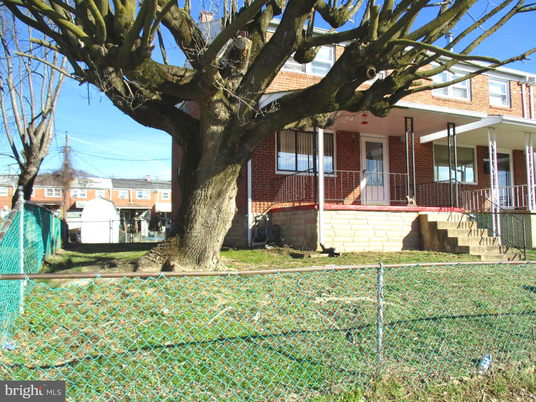 9742 Conmar Road Baltimore, MD 21220 - Photo 1 of 22 a view of a house with a yard