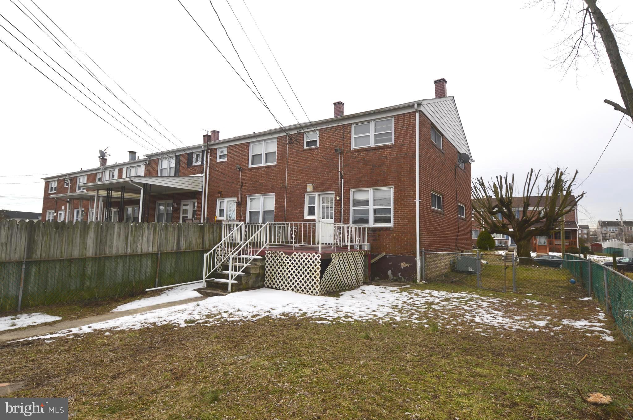 9742 Conmar Road Baltimore, MD 21220 - Photo 19 of 22 a street view along with residential houses