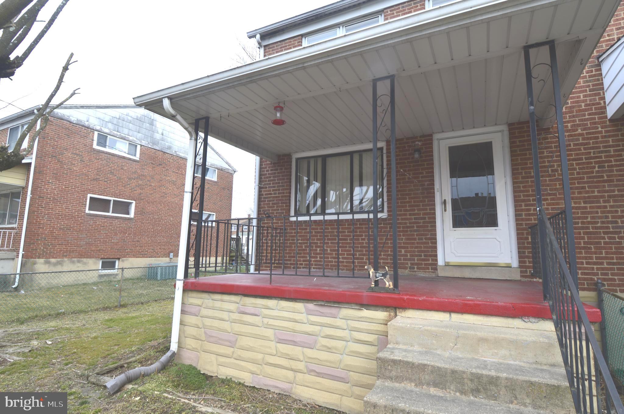 9742 Conmar Road Baltimore, MD 21220 - Photo 20 of 22 a view of a house with backyard and wooden fence