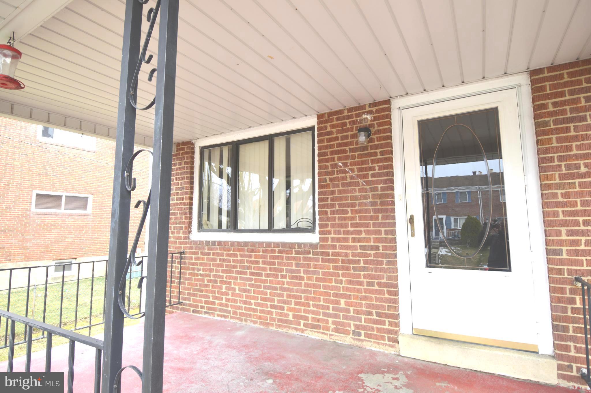 9742 Conmar Road Baltimore, MD 21220 - Photo 3 of 22 a view of a door and a window