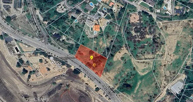 an aerial view of a residential houses with outdoor space