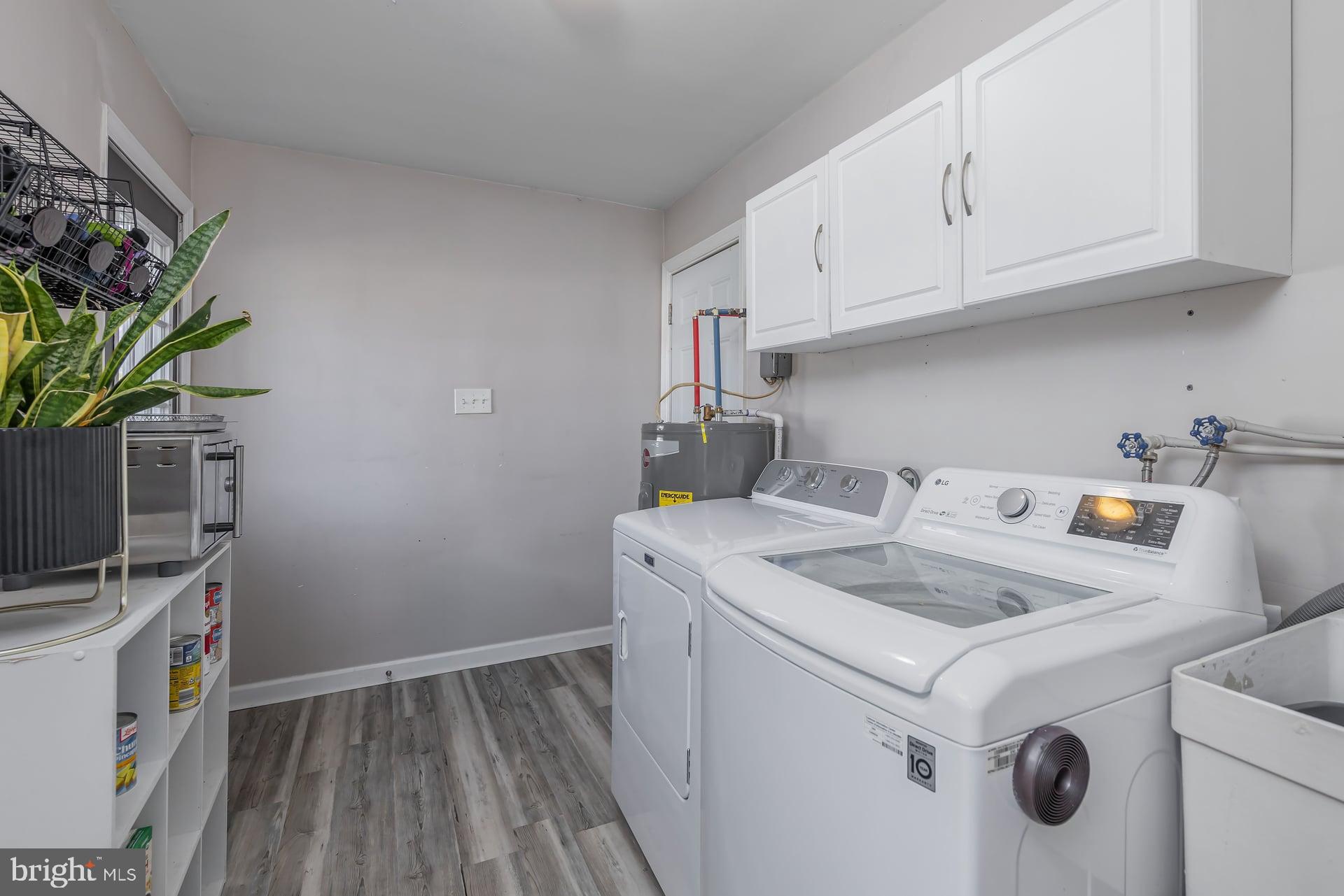 427 Birch Drive Mickleton, NJ 08056 - Photo 17 of 26 a utility room with dryer and washer