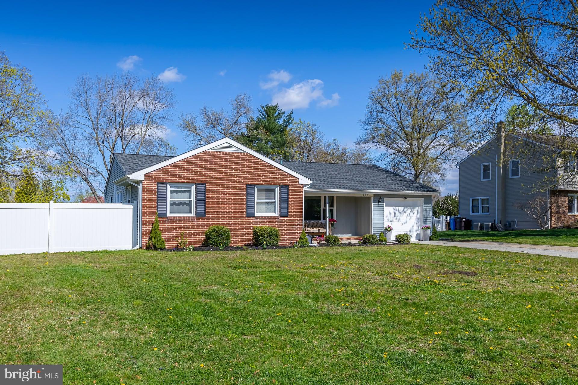 427 Birch Drive Mickleton, NJ 08056 - Photo 26 of 26 a front view of a house with a yard and trees