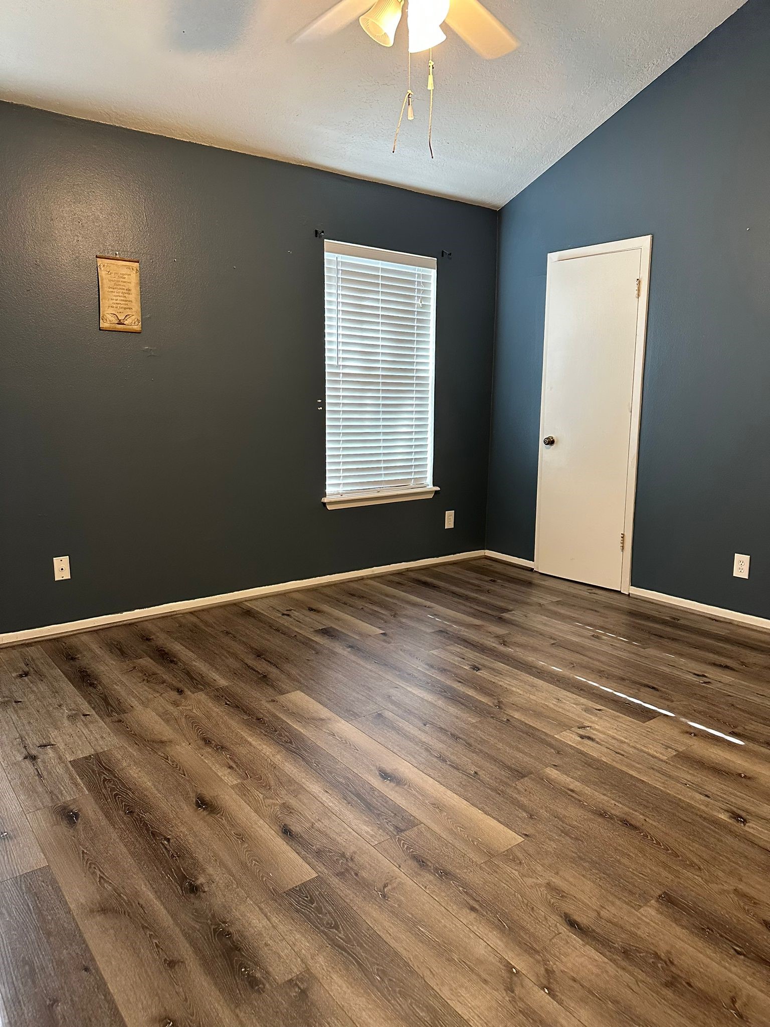 7305 South Gessner Road Houston, TX 77036 - Photo 3 of 24 a view of room with window and ceiling fan