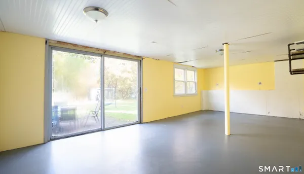 a view of an empty room and window