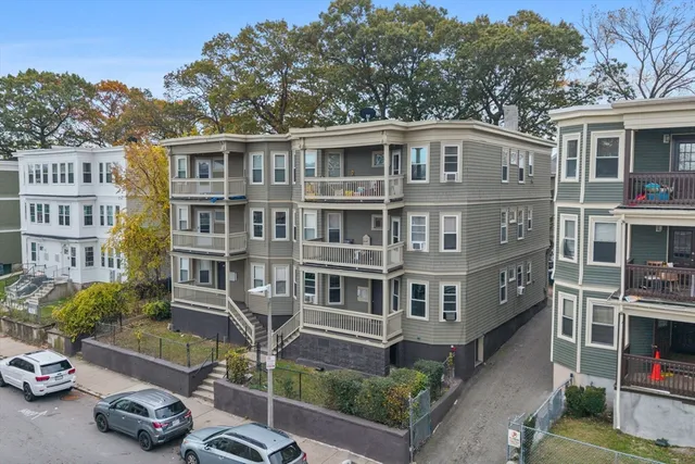 a car parked in front of a building