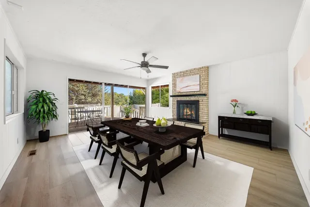 a view of a chairs on wooden deck