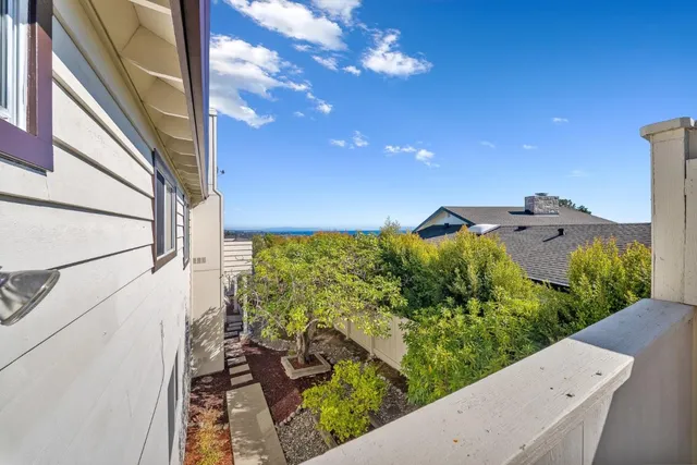 a bedroom with a bed and lamp