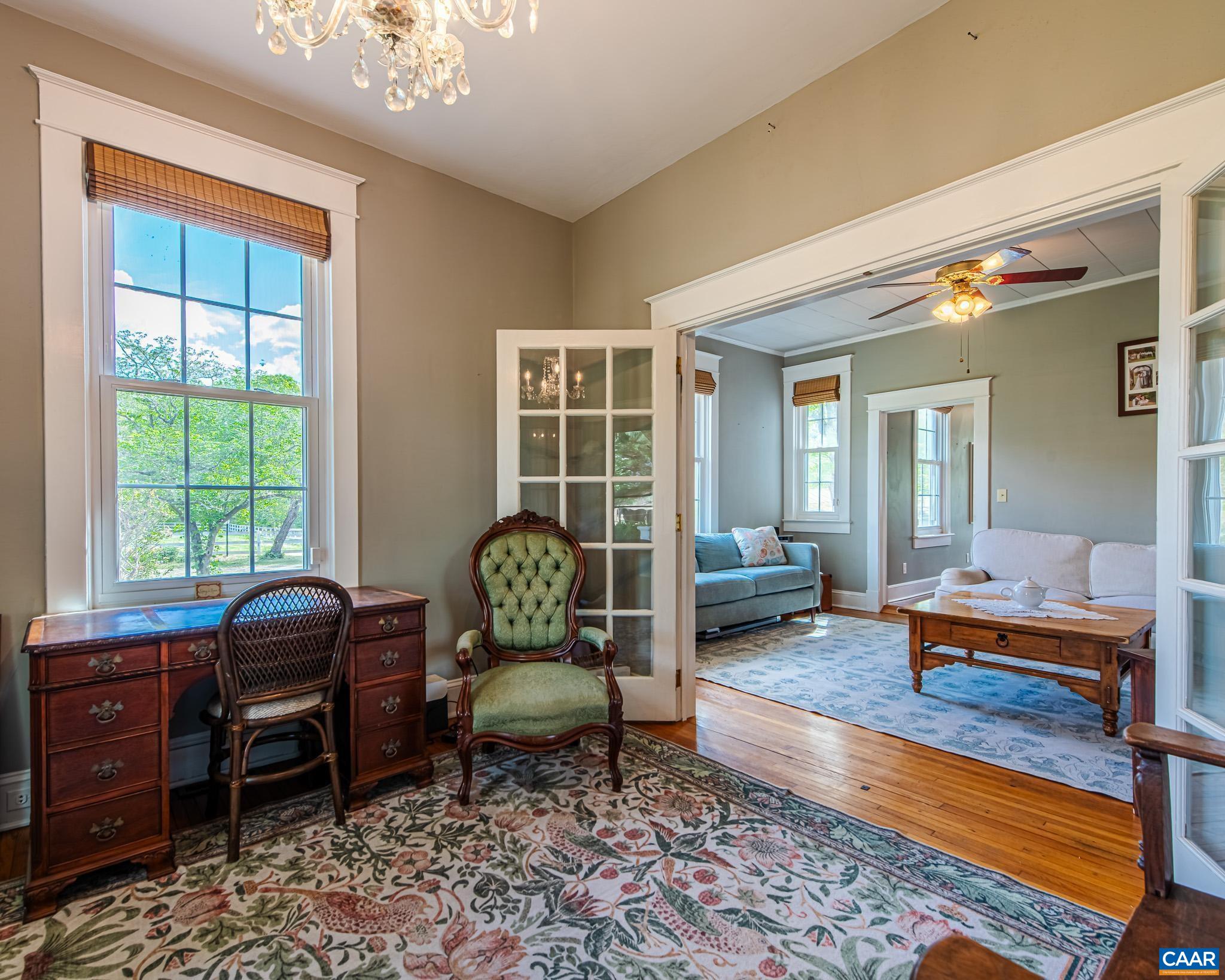 12500 Shannon Hill Road Louisa, VA 23093 - Photo 14 of 59 a living room with furniture and a window