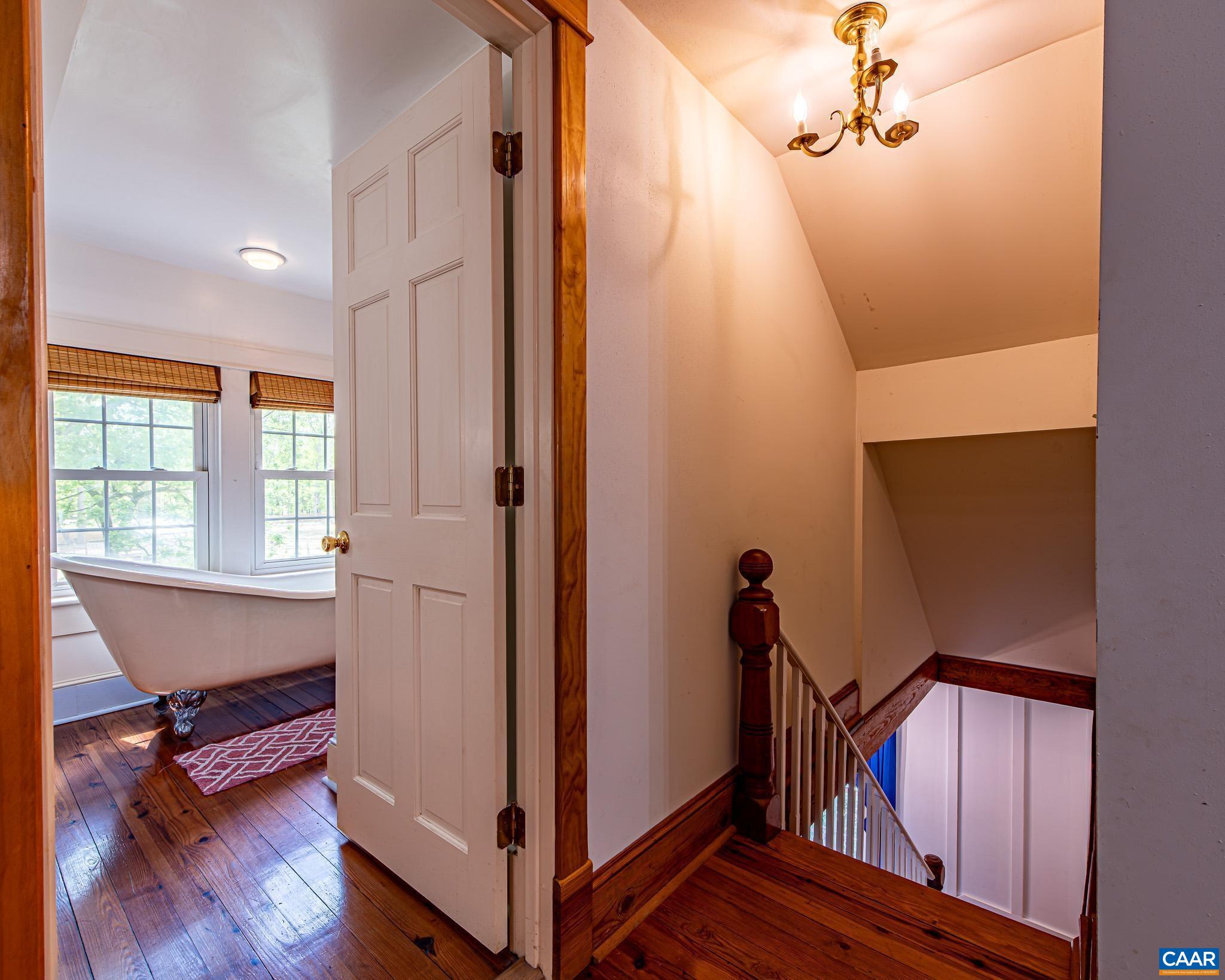 12500 Shannon Hill Road Louisa, VA 23093 - Photo 22 of 59 a view of a hallway with furniture and a window