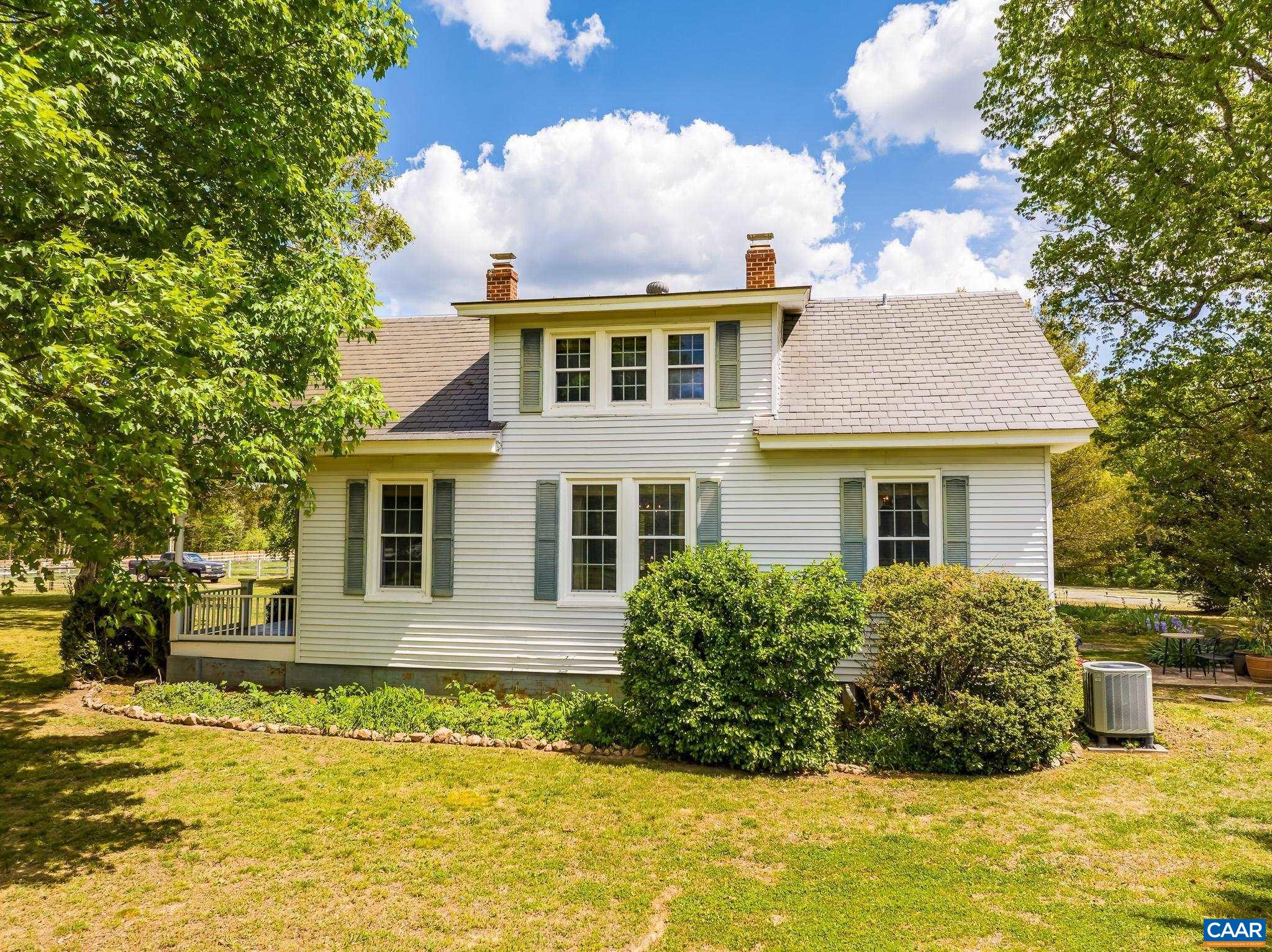 12500 Shannon Hill Road Louisa, VA 23093 - Photo 5 of 59 a view of a house with swimming pool and a porch