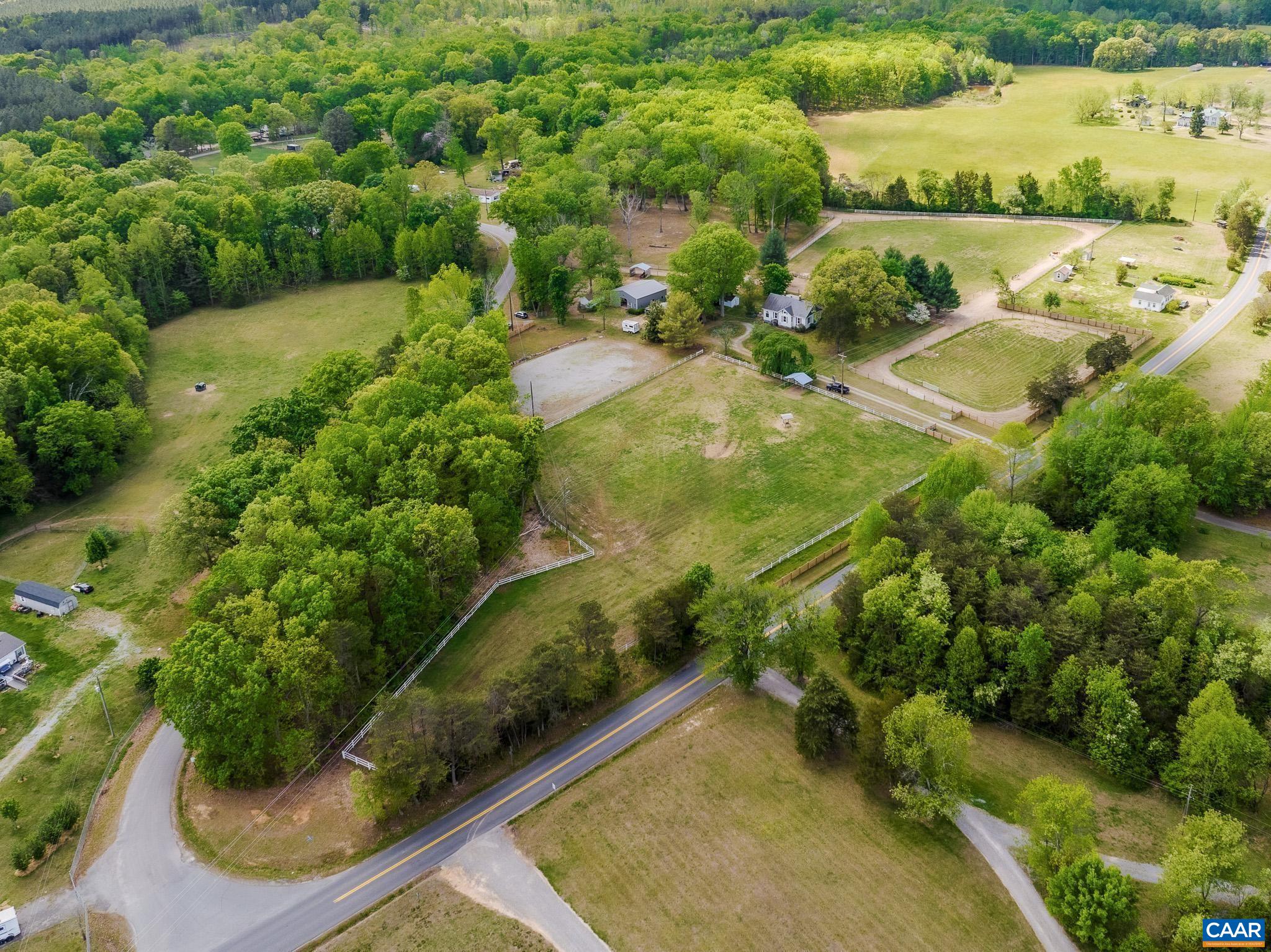 12500 Shannon Hill Road Louisa, VA 23093 - Photo 56 of 59 an aerial view of a house with a yard and lake view