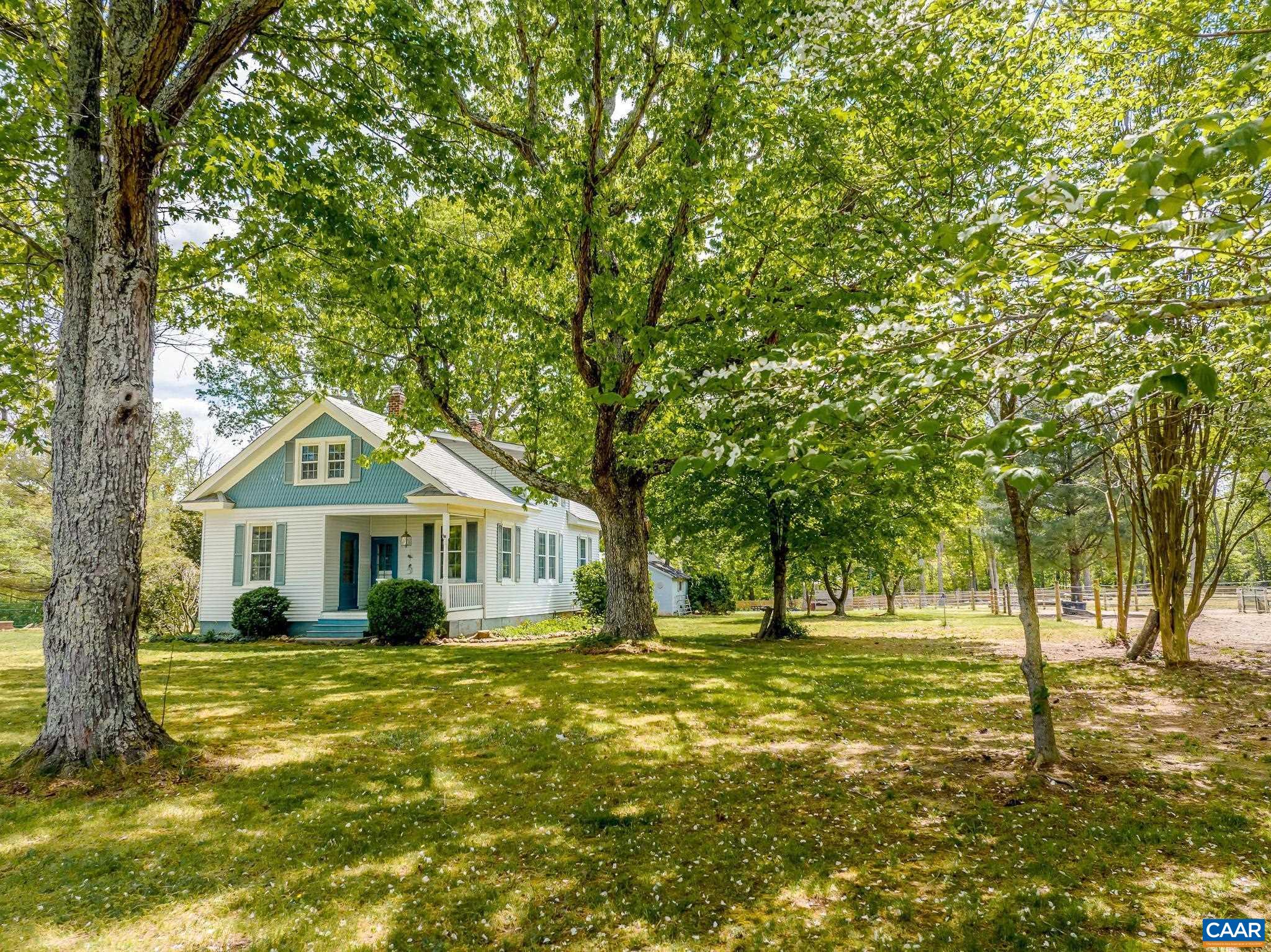 12500 Shannon Hill Road Louisa, VA 23093 - Photo 6 of 59 a front view of a house with a yard
