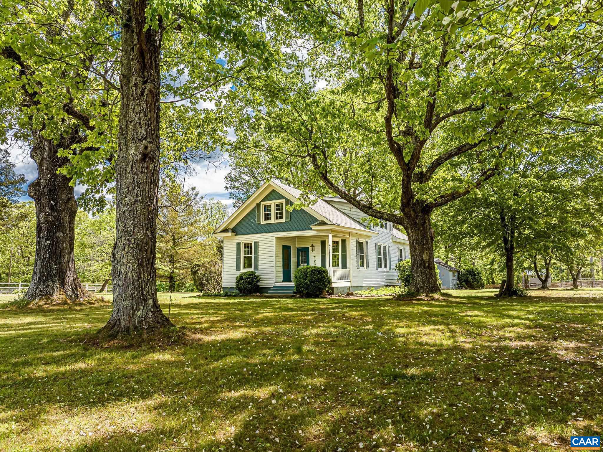 12500 Shannon Hill Road Louisa, VA 23093 - Photo 7 of 59 a front view of a house with a garden