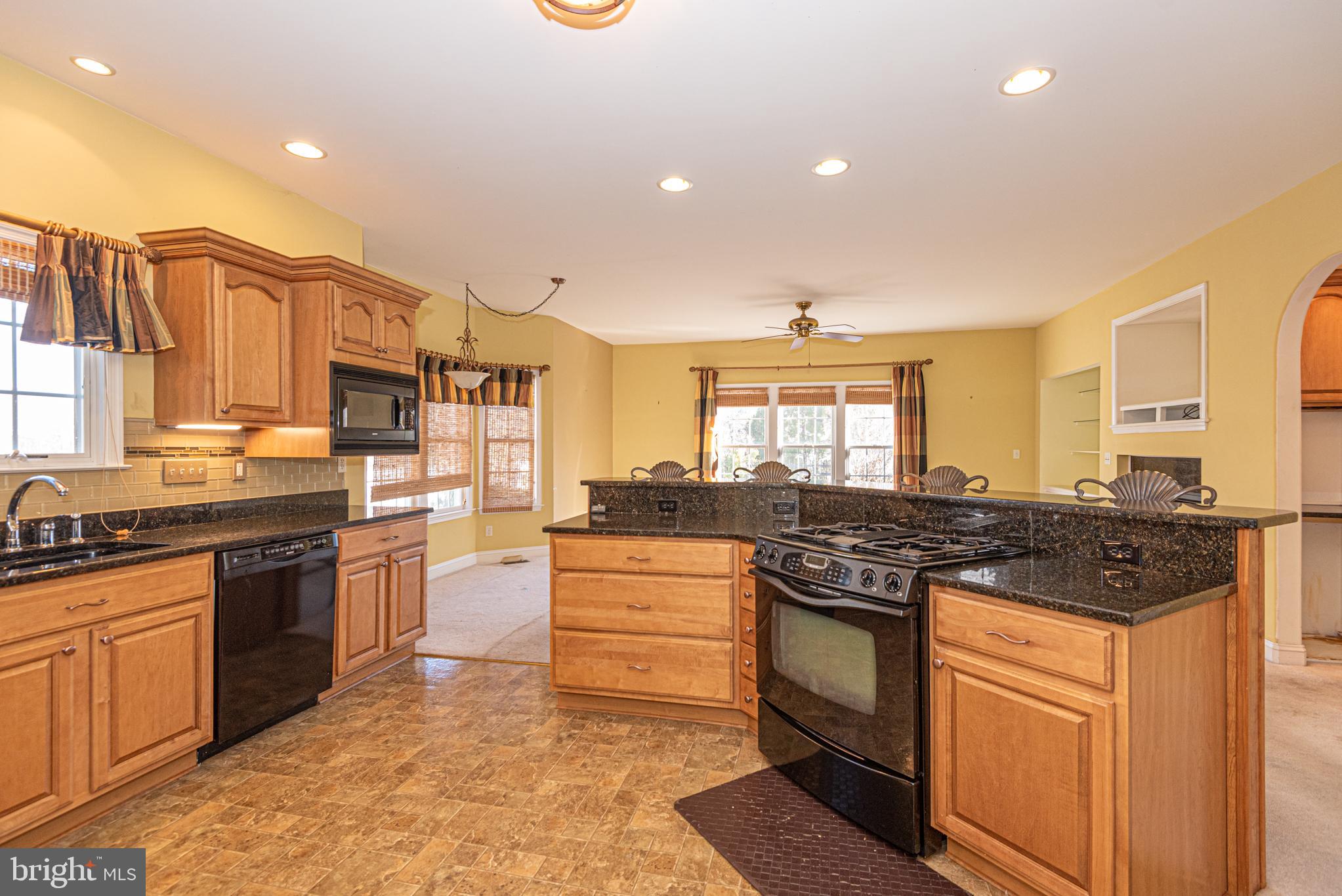 6023 Tarry Town Road Salisbury, MD 21801 - Photo 14 of 61 Spacious kitchen with warm wood accents.