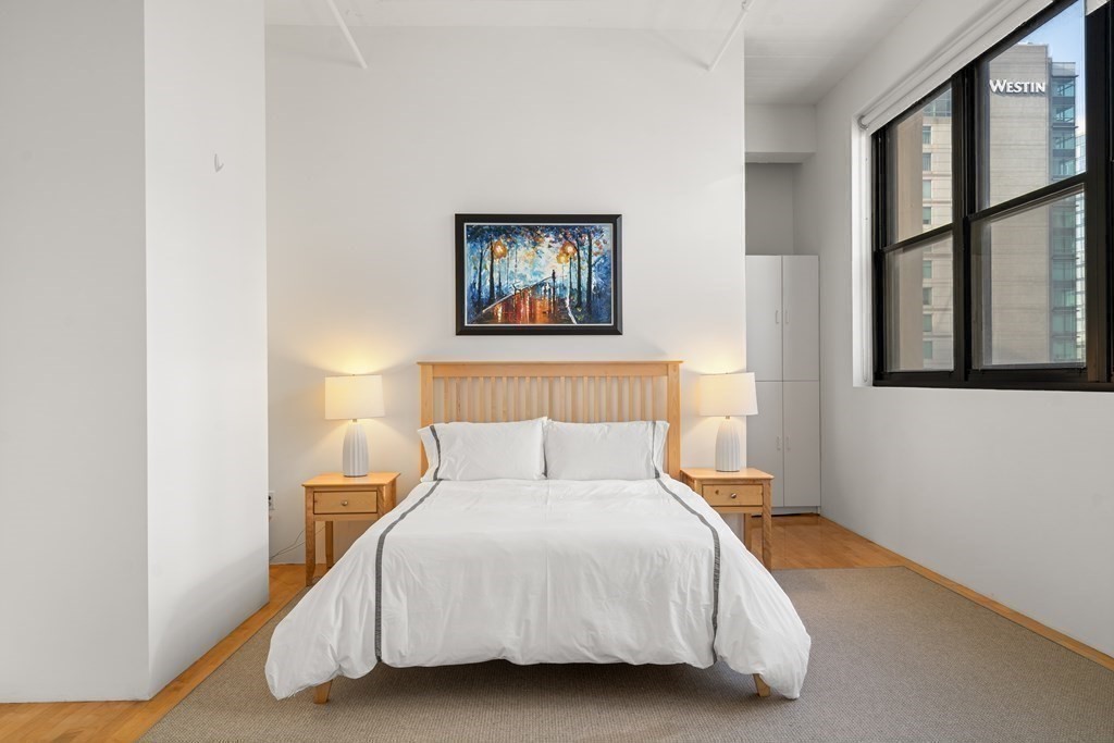 437 D Street, Unit 6A Boston, MA 02210 - Photo 15 of 26 a bedroom with a bed and a window