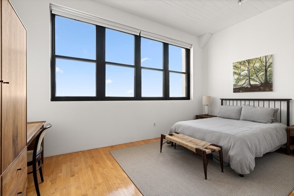 437 D Street, Unit 6A Boston, MA 02210 - Photo 19 of 26 a bedroom with a bed and a window