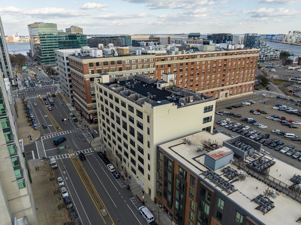 437 D Street, Unit 6A Boston, MA 02210 - Photo 22 of 26 a city view with tall buildings