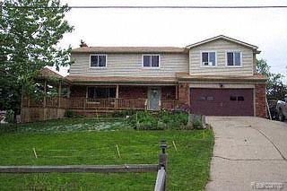 2498 Grove Park Road Fenton, MI 48430 - Photo 1 of 1 Front