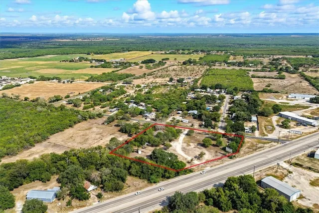 a view of a city with an ocean view