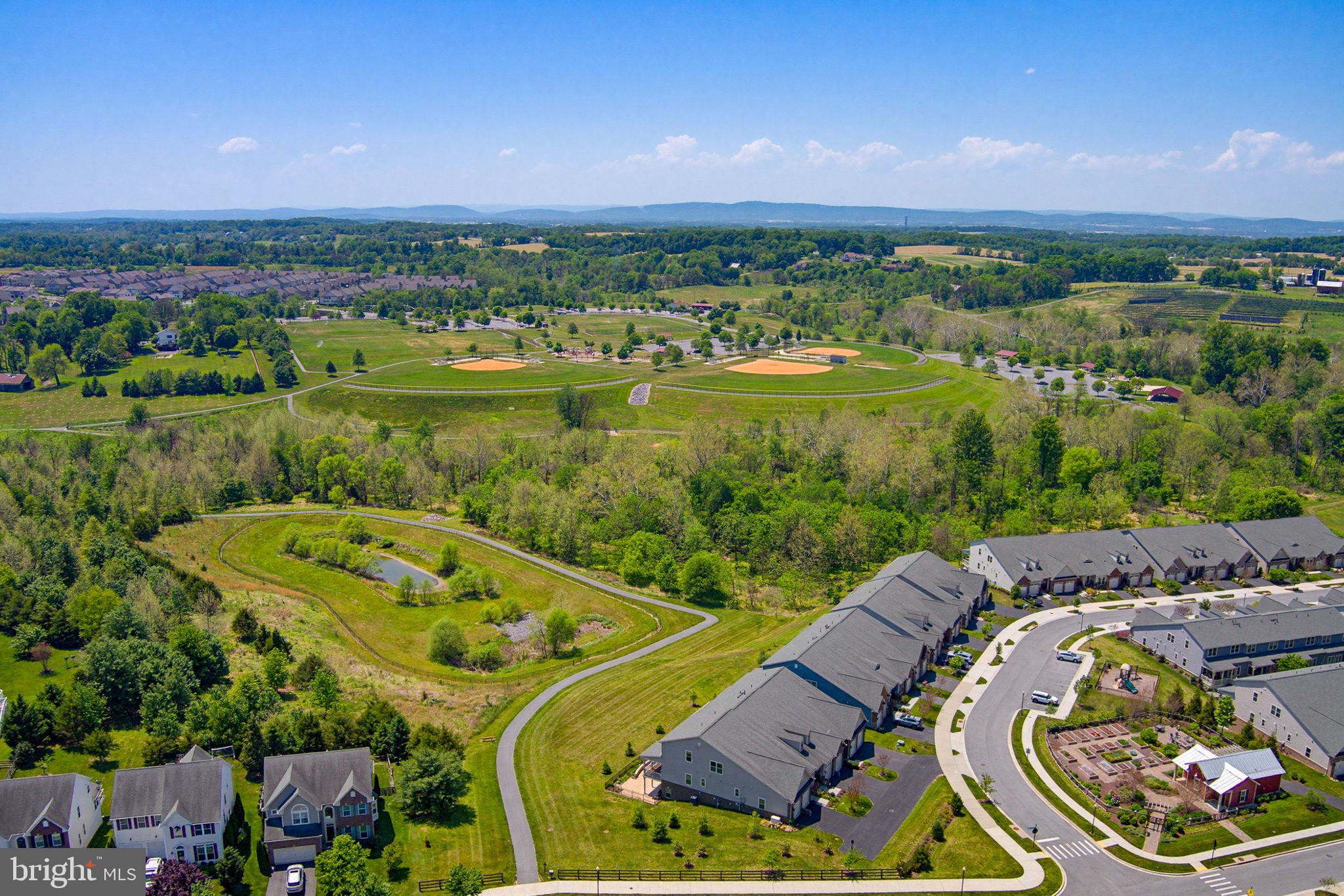 3816 Fulham Road Frederick, MD 21704 - Photo 52 of 77 an aerial view of a house with outdoor space and lake view