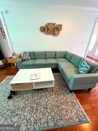 a living room with a couch and a coffee table