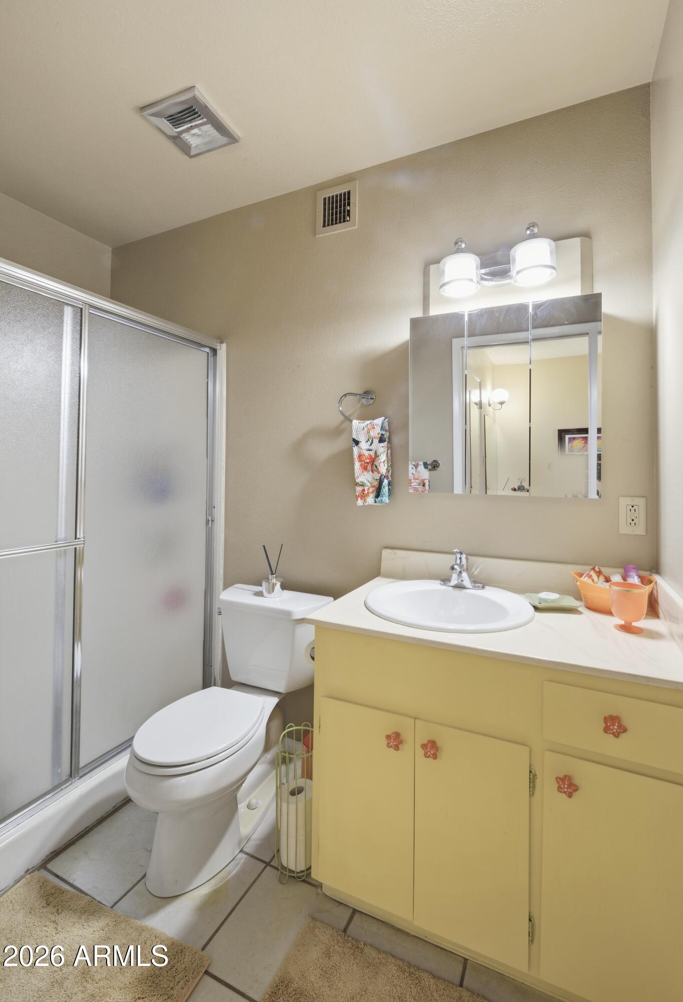 641 South Power Road, Unit 366 Mesa, AZ 85206 - Photo 13 of 22 a spacious bathroom with a sink toilet and a mirror