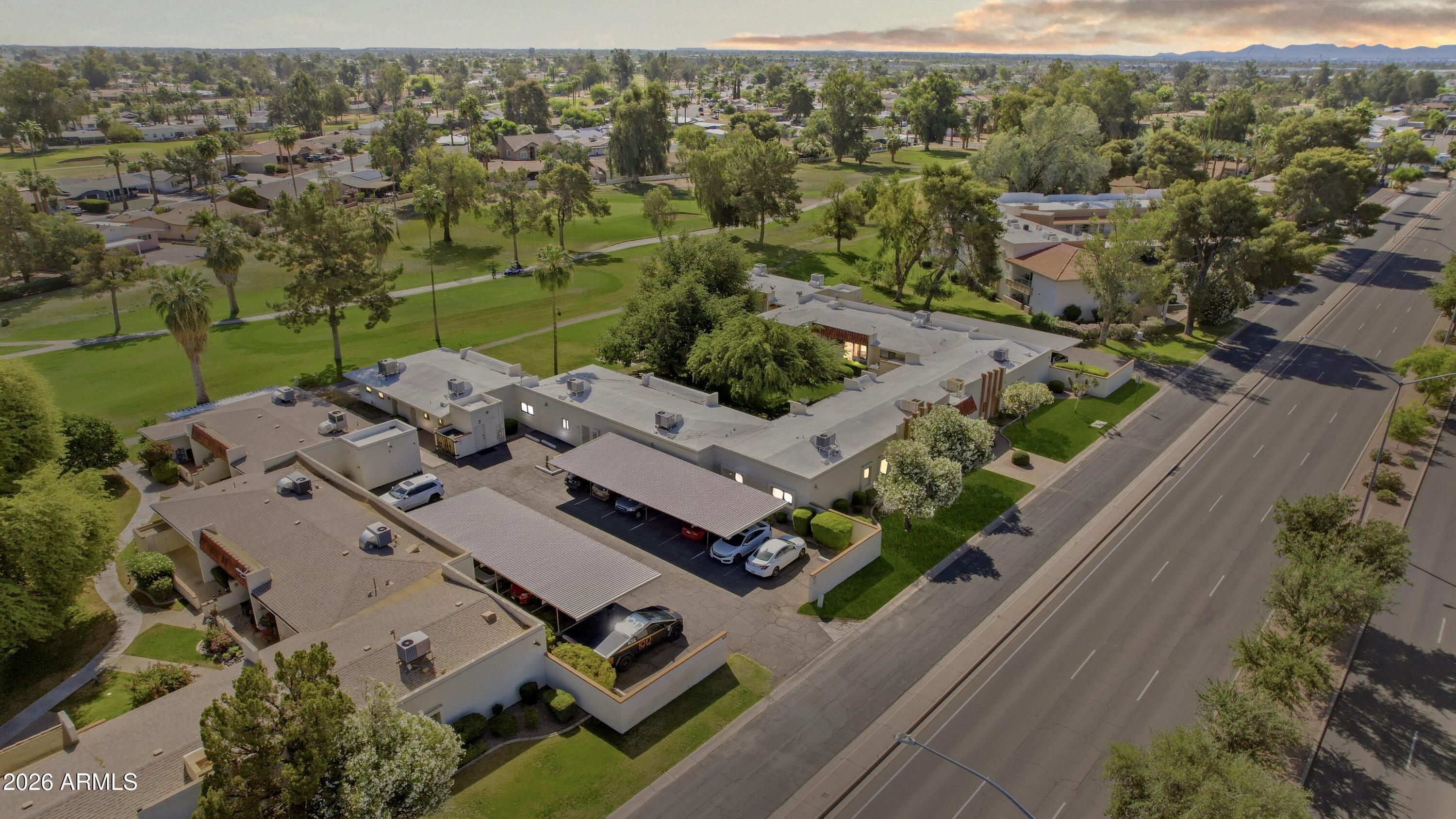 641 South Power Road, Unit 366 Mesa, AZ 85206 - Photo 14 of 22 an aerial view of a house with a yard
