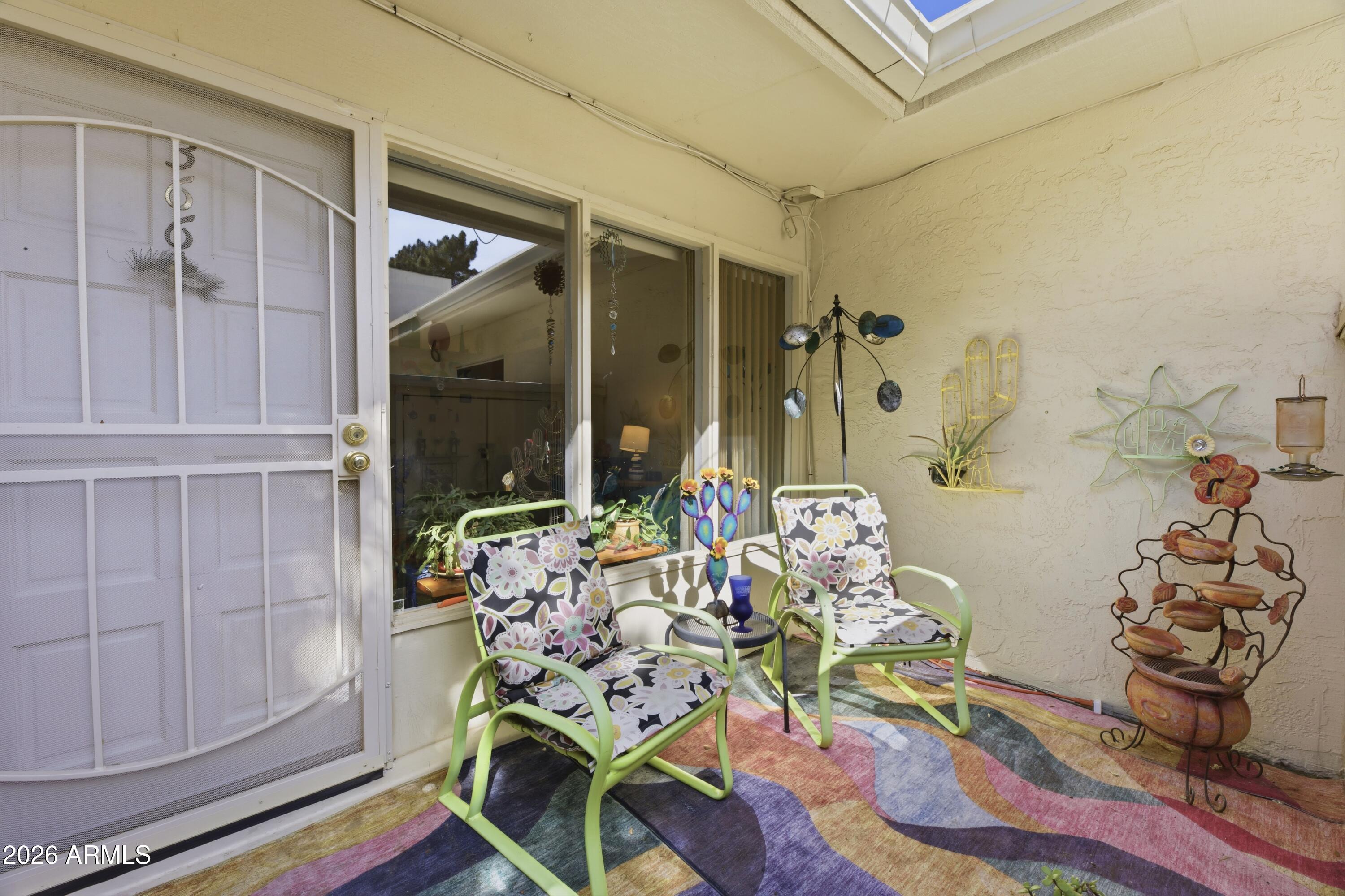641 South Power Road, Unit 366 Mesa, AZ 85206 - Photo 19 of 22 a living room with furniture
