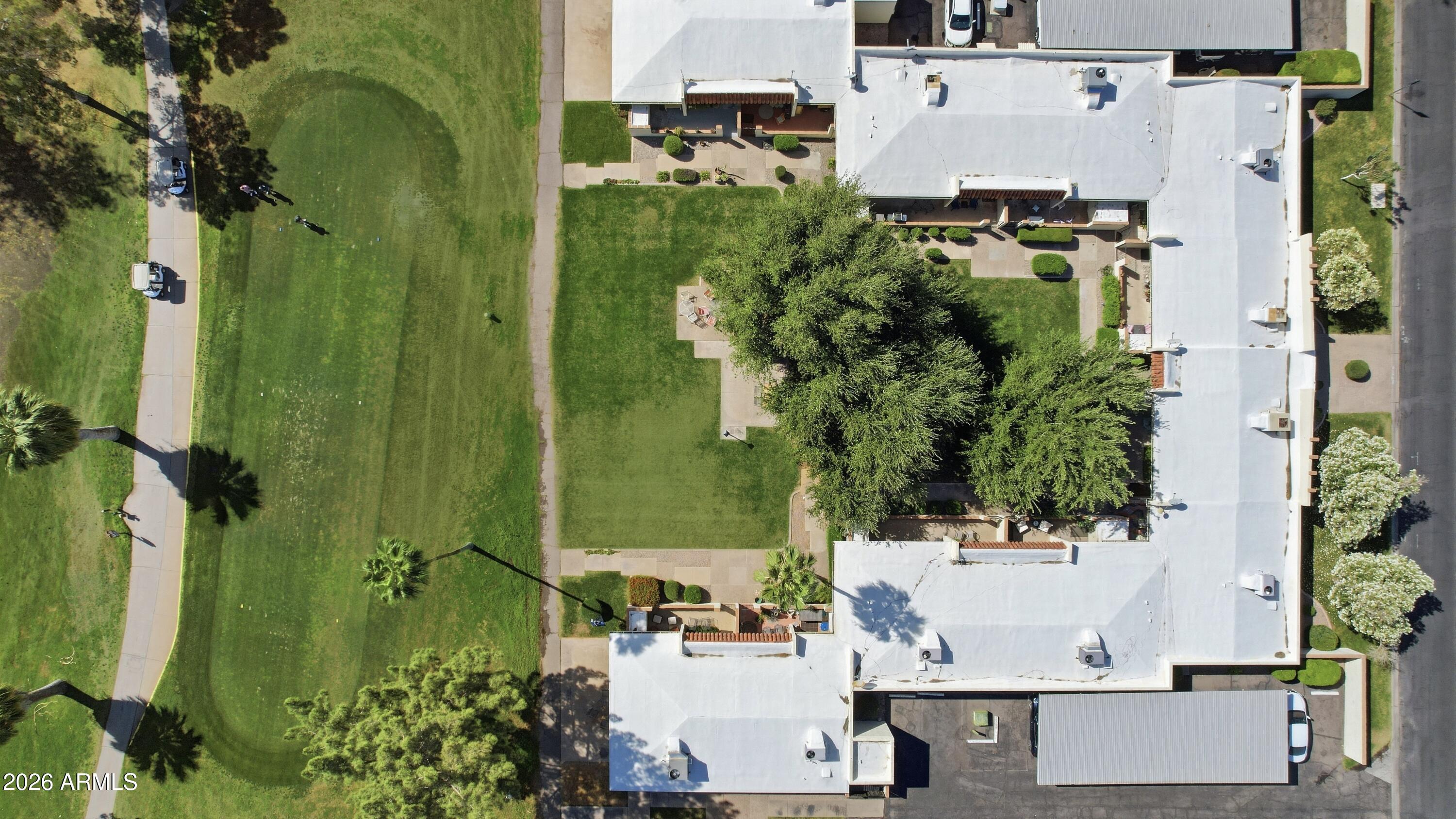 641 South Power Road, Unit 366 Mesa, AZ 85206 - Photo 20 of 22 an aerial view of residential houses with outdoor space and trees