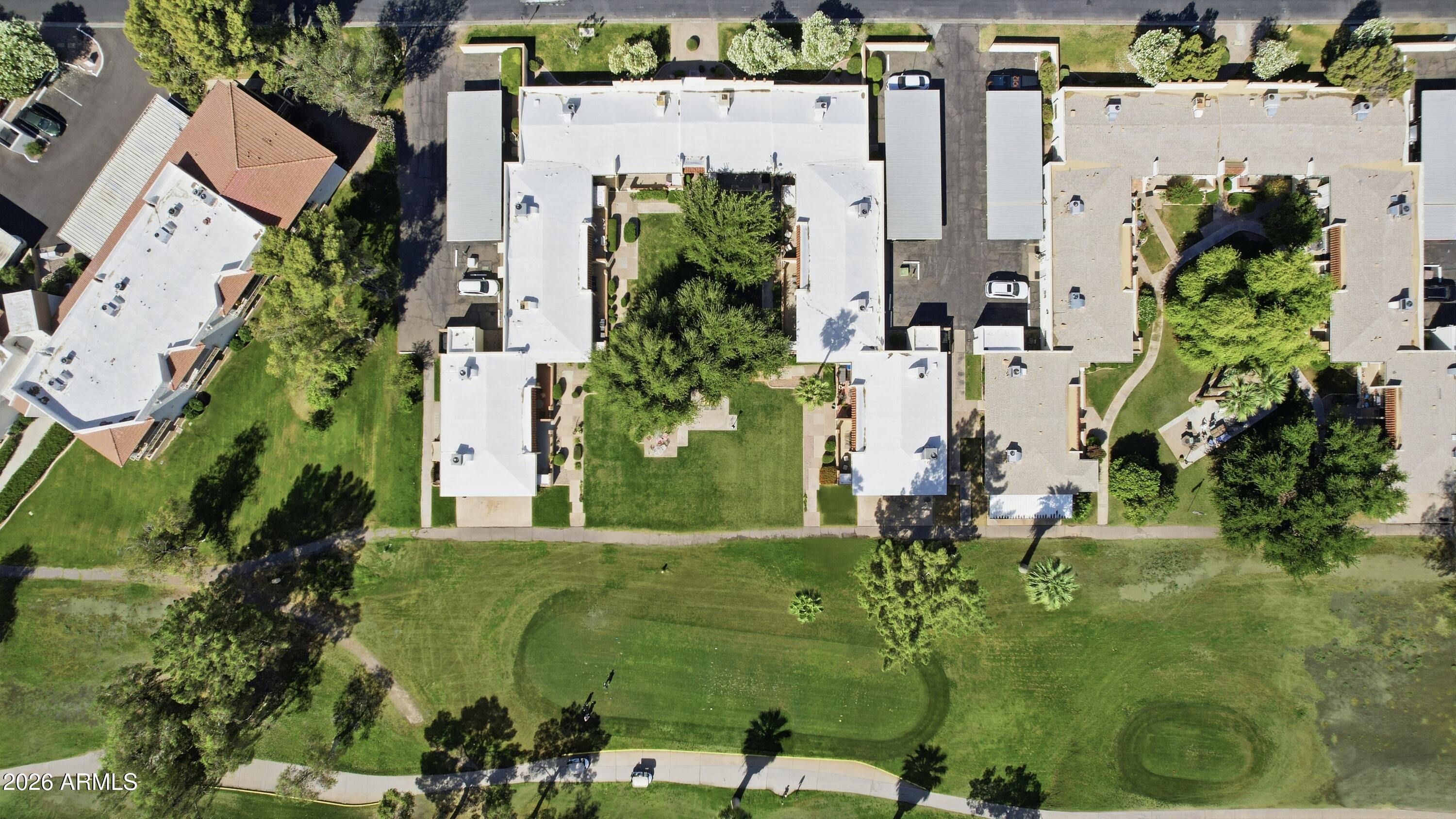 641 South Power Road, Unit 366 Mesa, AZ 85206 - Photo 21 of 22 an aerial view of a house with a yard