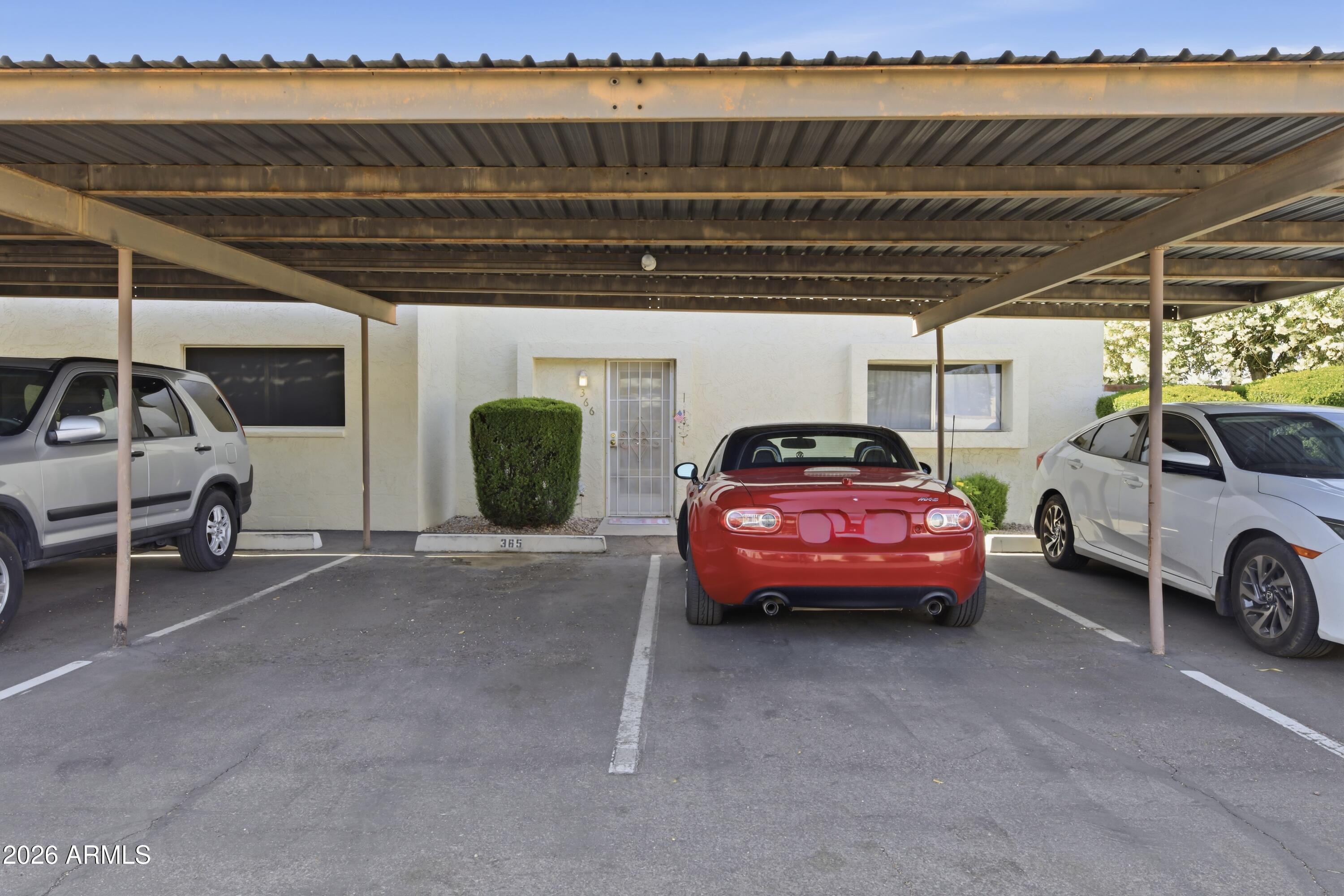 641 South Power Road, Unit 366 Mesa, AZ 85206 - Photo 22 of 22 a view of a car in garage