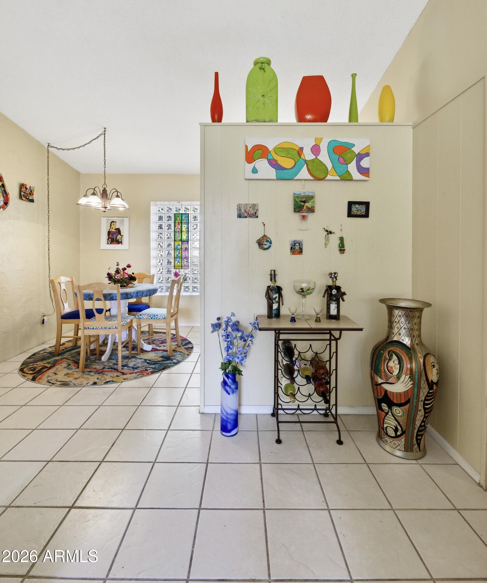 641 South Power Road, Unit 366 Mesa, AZ 85206 - Photo 5 of 22 a living room with furniture and decor