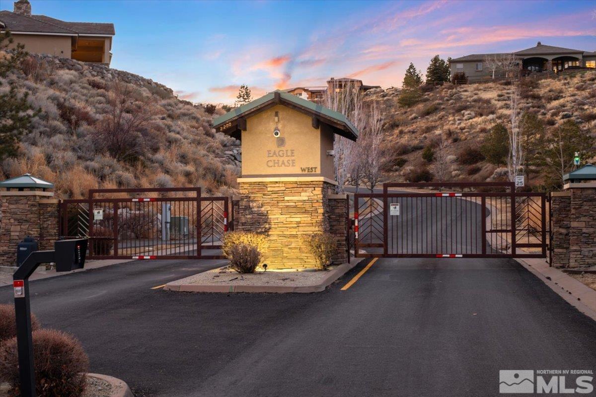 a view of a street with a building in the background