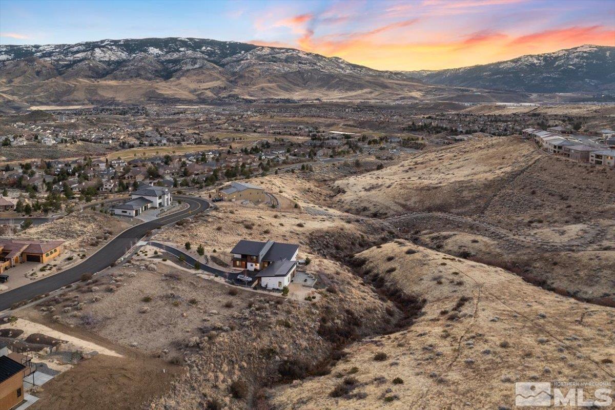 8673 Eagle Chase Trail, Unit 444 Reno, NV 89523 - Photo 2 of 14 a view of a mountain in the distance
