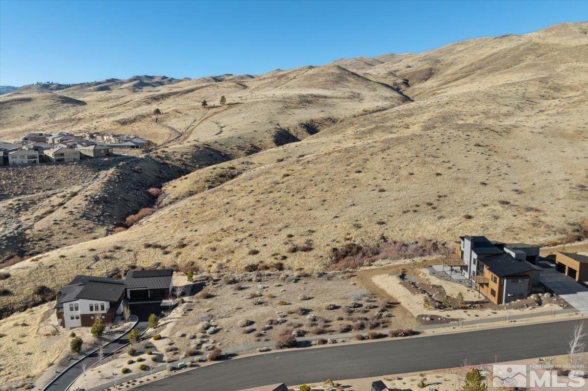 8673 Eagle Chase Trail, Unit 444 Reno, NV 89523 - Photo 3 of 14 a view of ocean and mountain