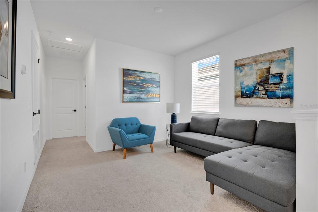 731 FIREROCK Lane DeBary, FL 32713 - Photo 14 of 39 a living room with furniture and a window