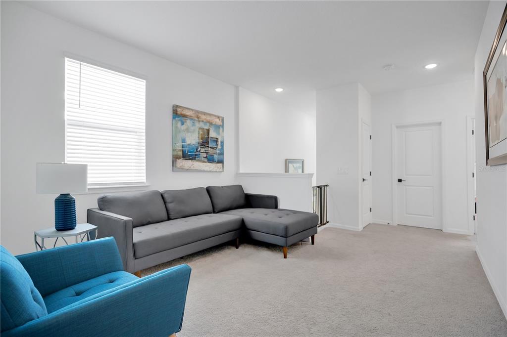 731 FIREROCK Lane DeBary, FL 32713 - Photo 15 of 39 a living room with furniture and a window