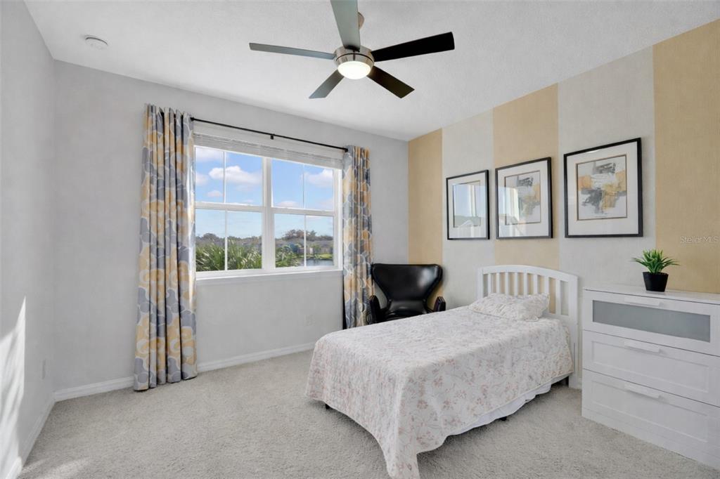 731 FIREROCK Lane DeBary, FL 32713 - Photo 19 of 39 a bedroom with a bed and a window