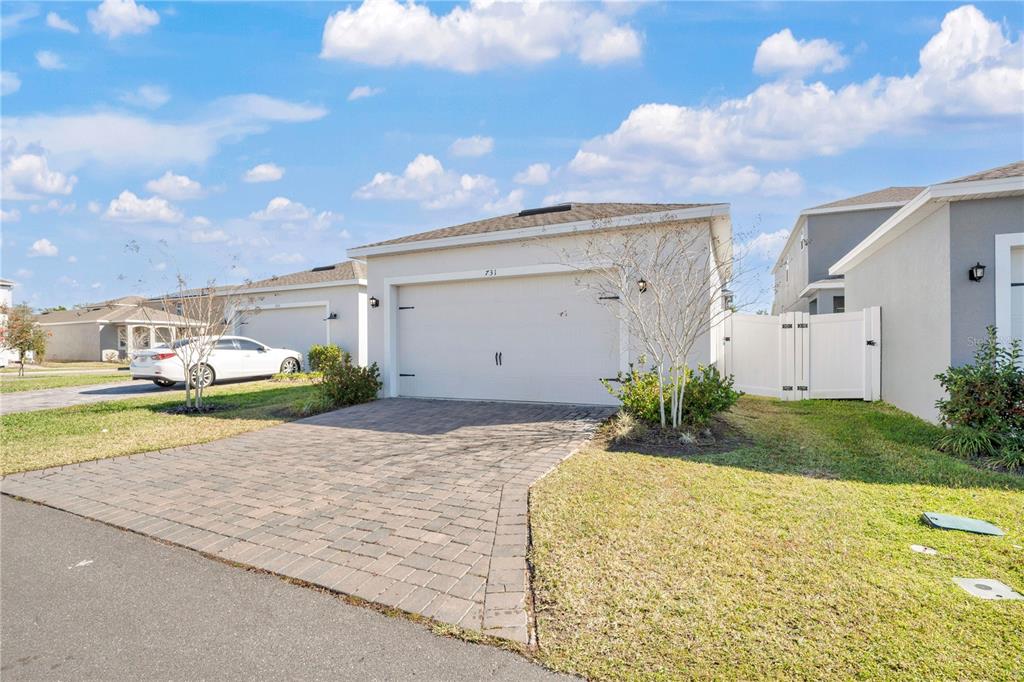 731 FIREROCK Lane DeBary, FL 32713 - Photo 28 of 39 a front view of a house with garden