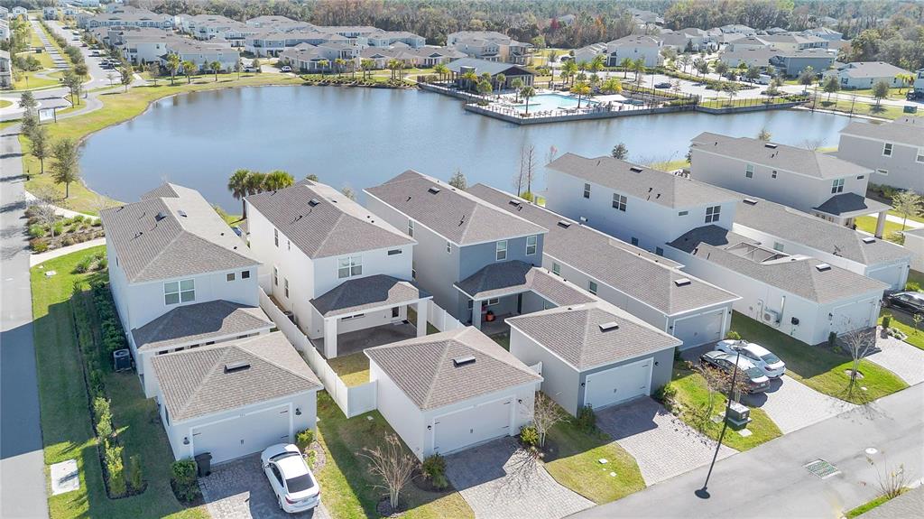 731 FIREROCK Lane DeBary, FL 32713 - Photo 3 of 39 an aerial view of a residential houses with outdoor space and lake view