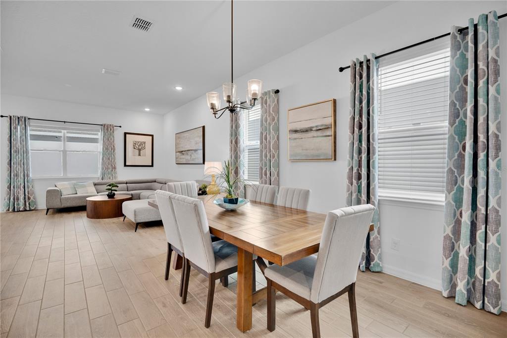 731 FIREROCK Lane DeBary, FL 32713 - Photo 7 of 39 a view of a dining room with furniture